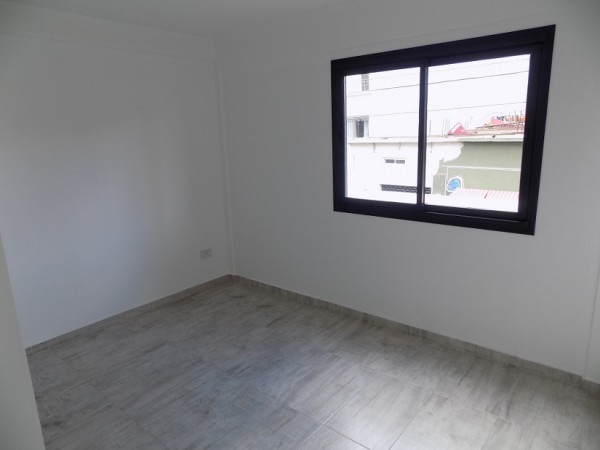 DEPARTAMENTO 2 AMBIENTES EN  PISO 1, DTO A,  CON BALCON AL FRENTE Y COCHERA, TEMPERLEY.
