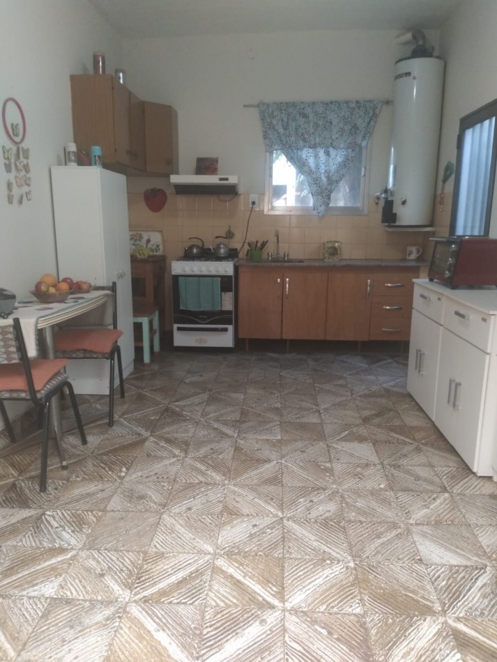 CASA CON PLANTA ALTA Y GARAGE